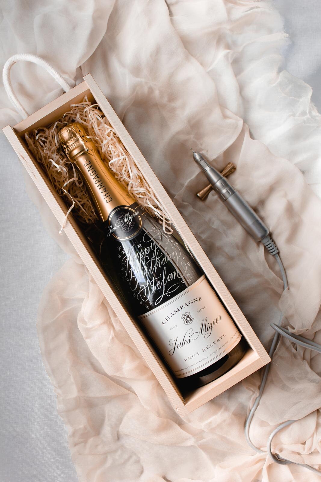 Hand engraved champagne bottle