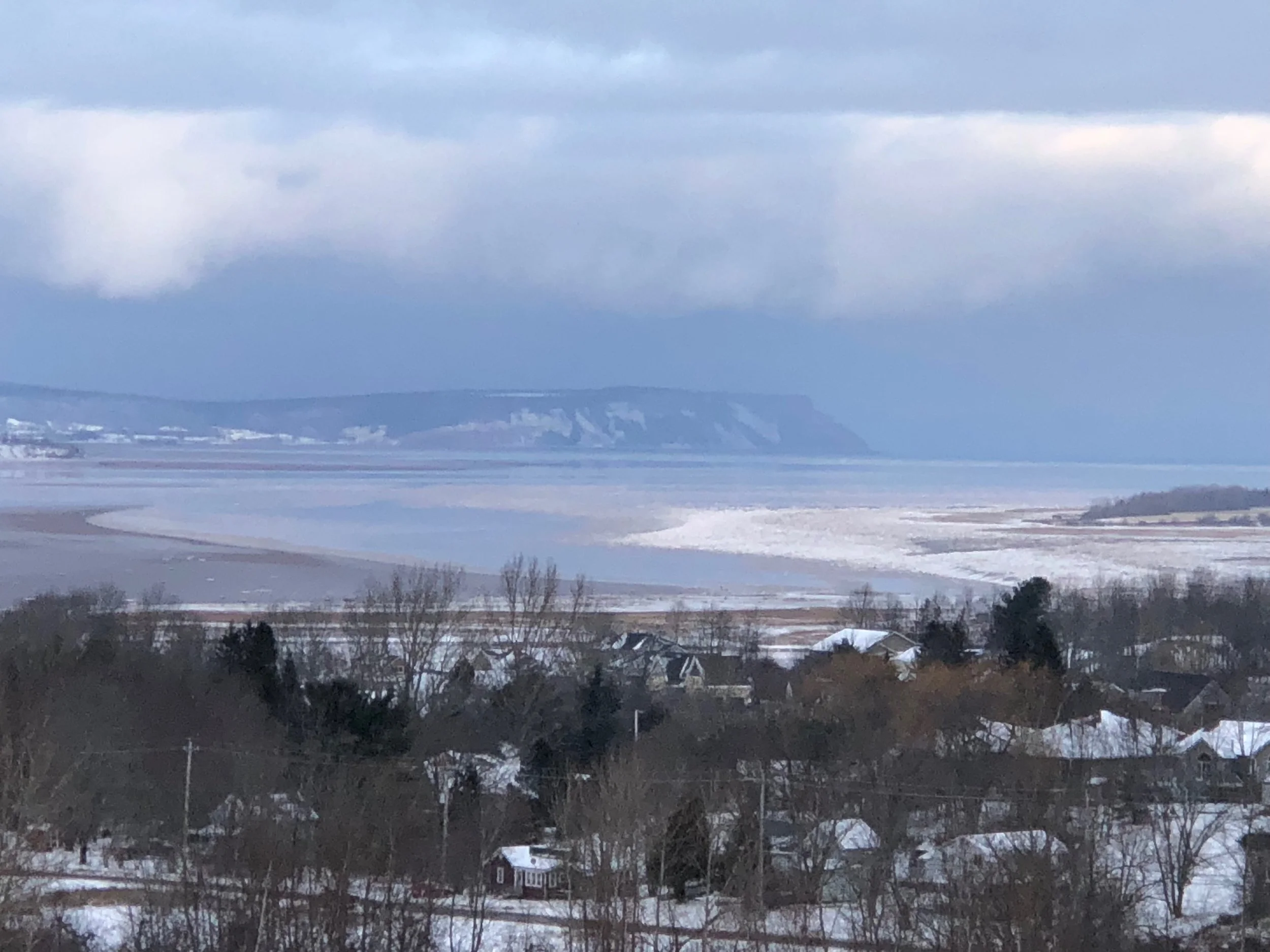 Cape Blomidon rises over the Minas Basin and the Bay of Fundy
