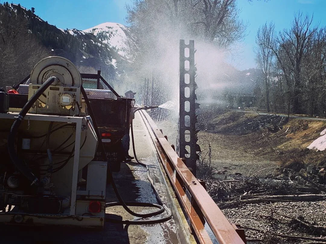 Spring 2019: Cleaning HWY 75 Bridge Artwork 