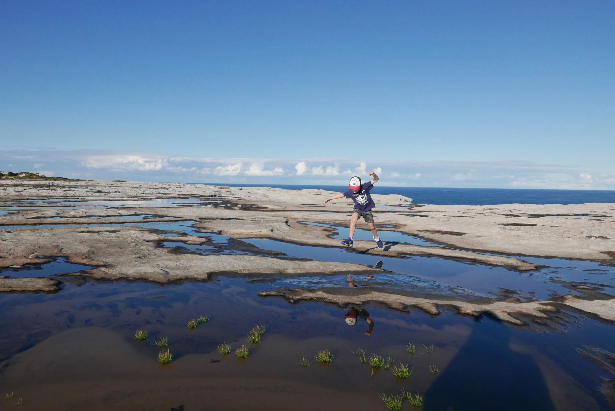 If only life could be as simple as jumping puddles. Or maybe it is, and some puddles are just bigger than others, and sometimes you make it, and sometimes you land in the puddle. That was profound. Just call me Buddha. 