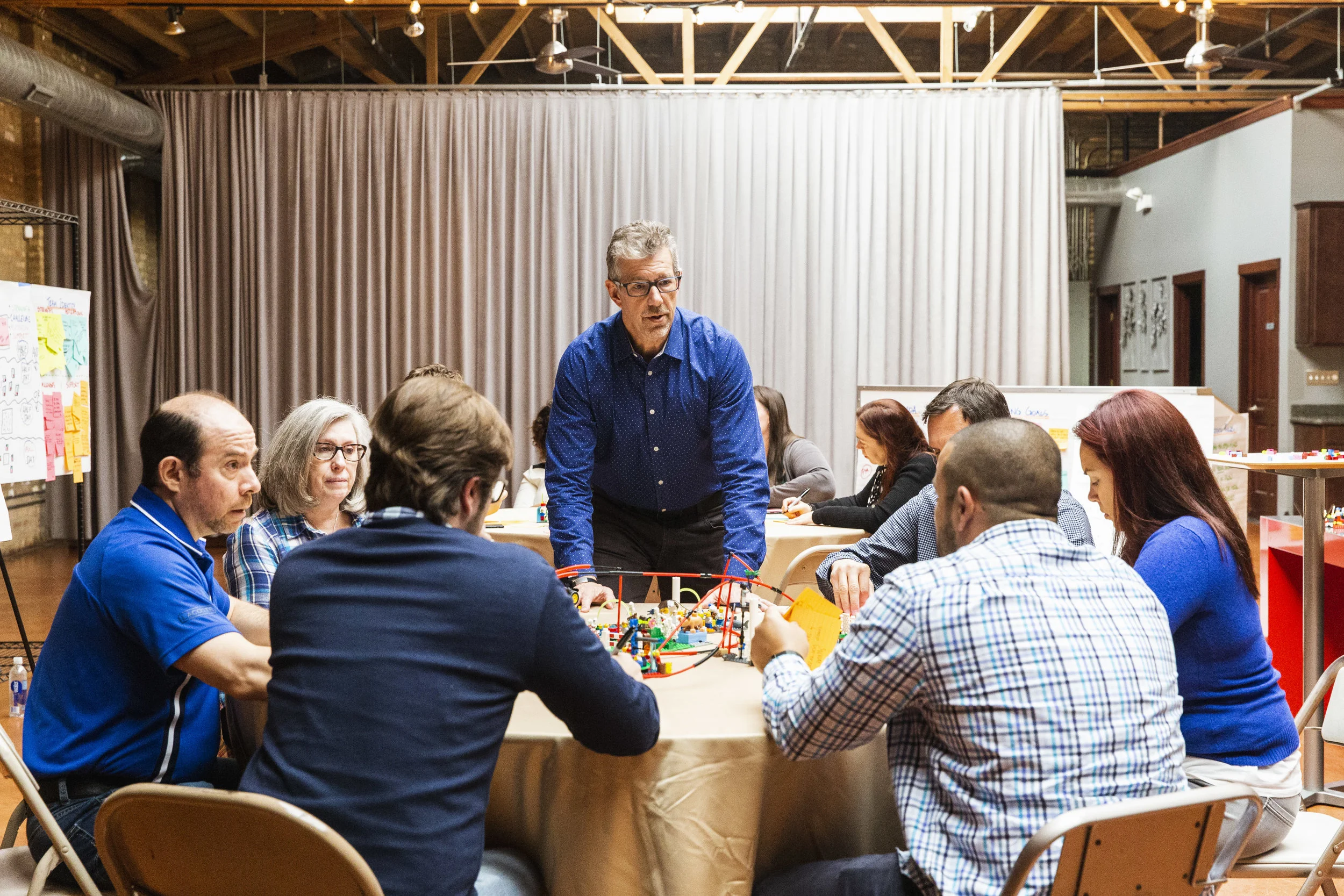 Greg facilitating a table.jpg