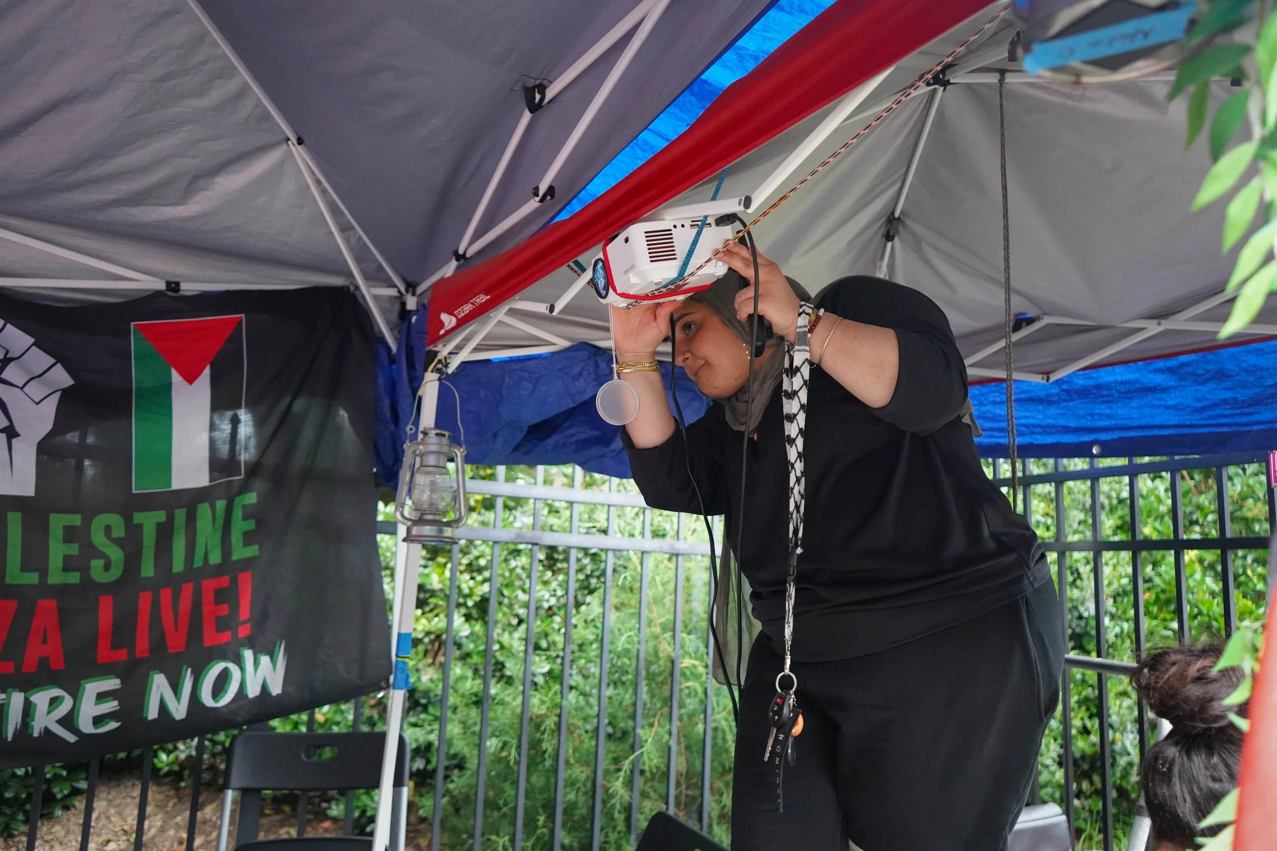 Jinan setting up projector.jpg