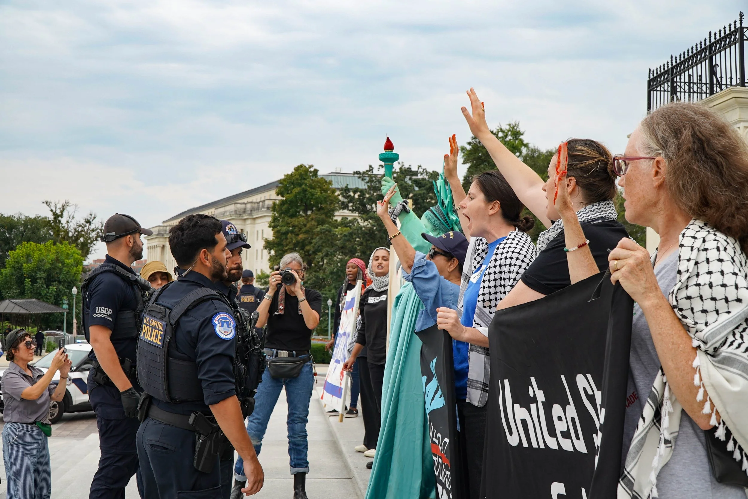 Protesters clash with police on the steps of the Capitol building. September 25, 2025.
