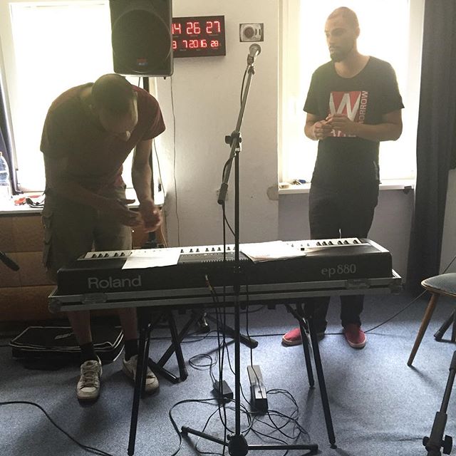 Phil and Jokaa working out the piano part.