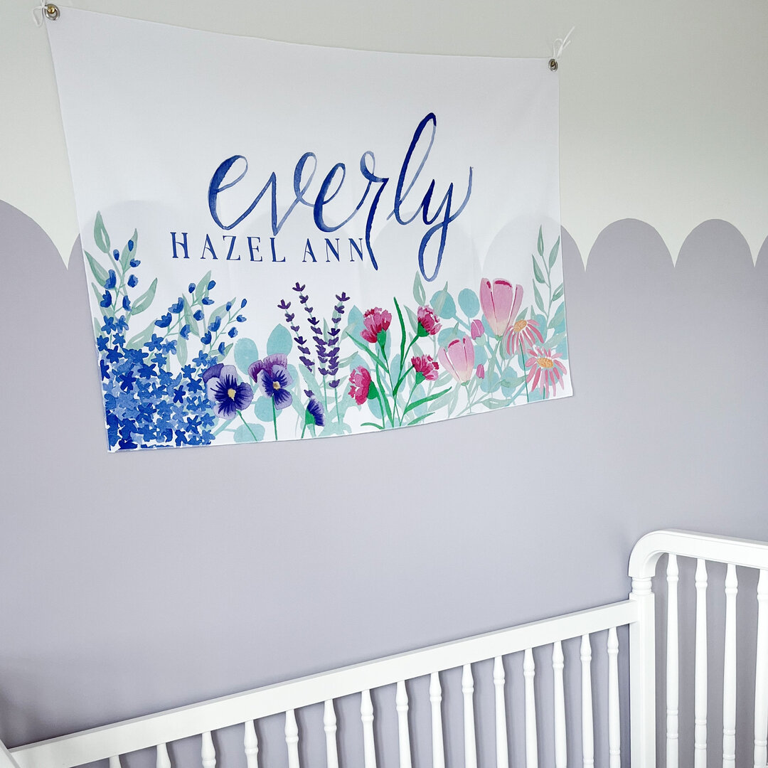 My first fabric banner test was for Everlys room. Florals and name painted by me. Love how it turned out. 💕