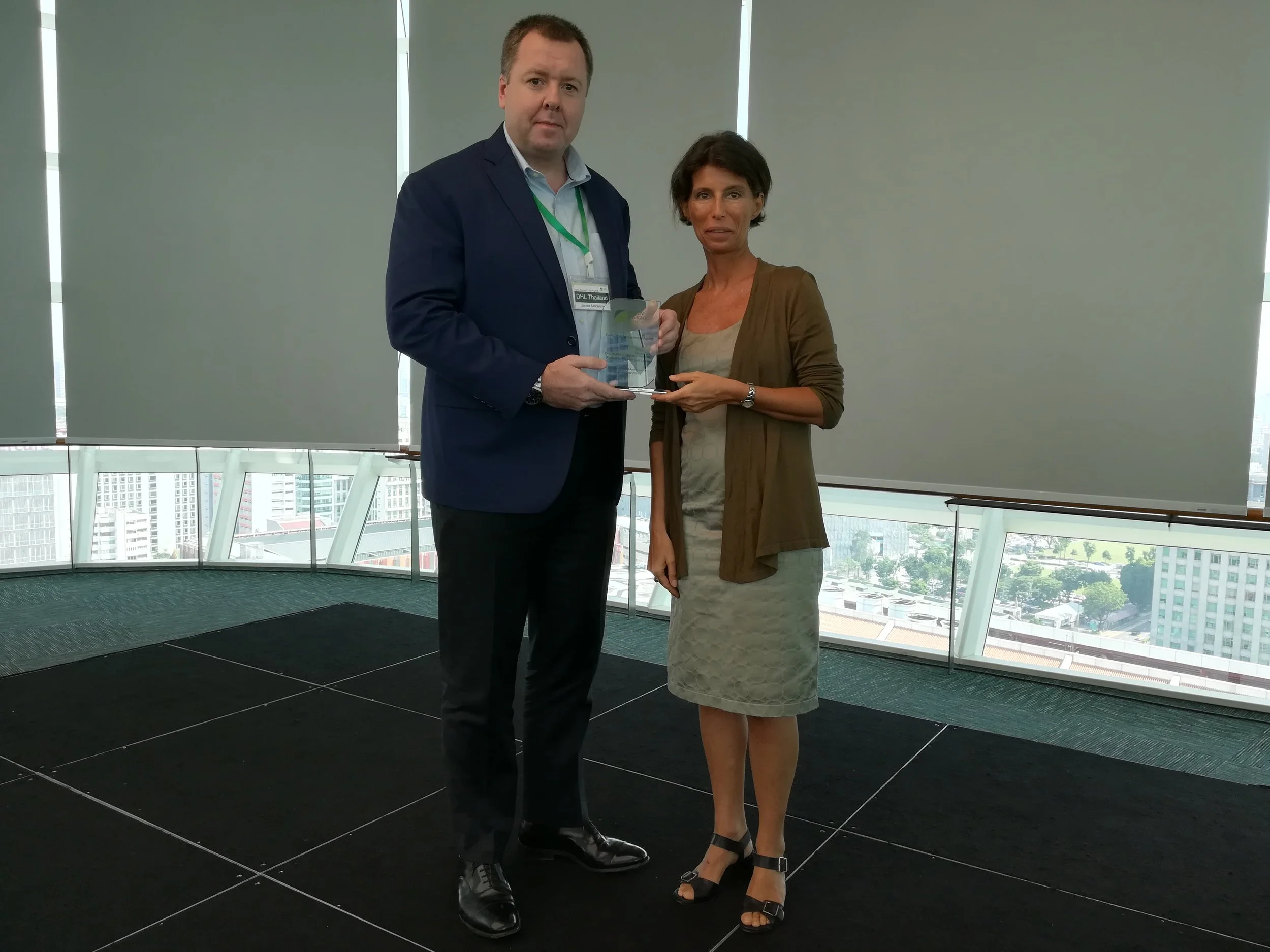 James with GFA Director Roxane Desmicht “DHL Supply Chain Thailand Transport are very proud to be working in partnership with Green Freight Asia. It is an honor and a privilege to be the first business in APAC to receive this prestigious award. It tells us we are making a difference to our environment and supports our global business target to be zero emissions by 2050. I’m delighted to say the Thailand Transport team are working on new and exciting initiatives to help further improve our emissions in 2019.” - James Macleerie, Transport Head for Thailand, Vietnam, Cambodia and Myanmar
