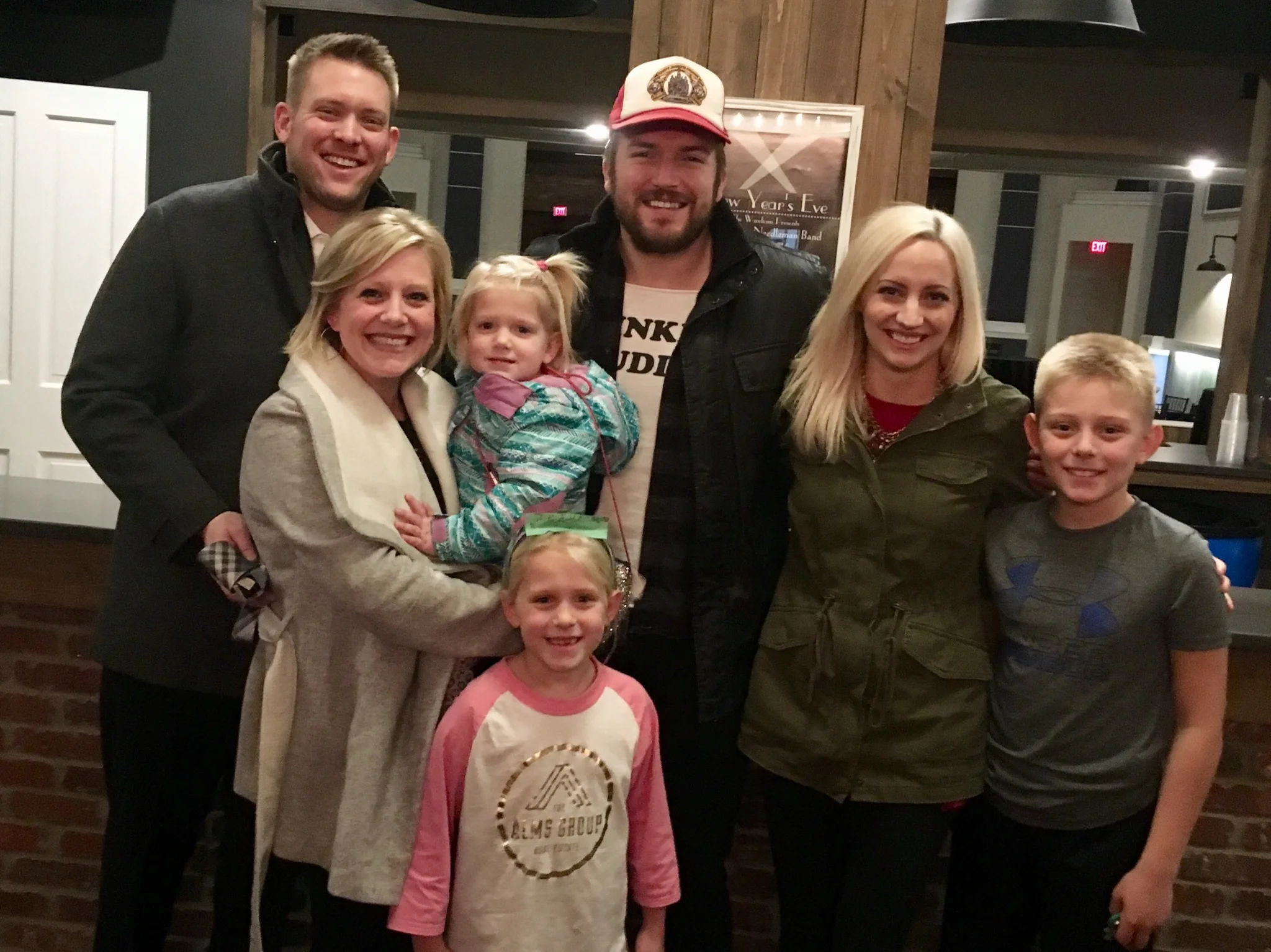 The Alms Group's Mike Goodpasture and his family, with Logan and his wife, Jill.