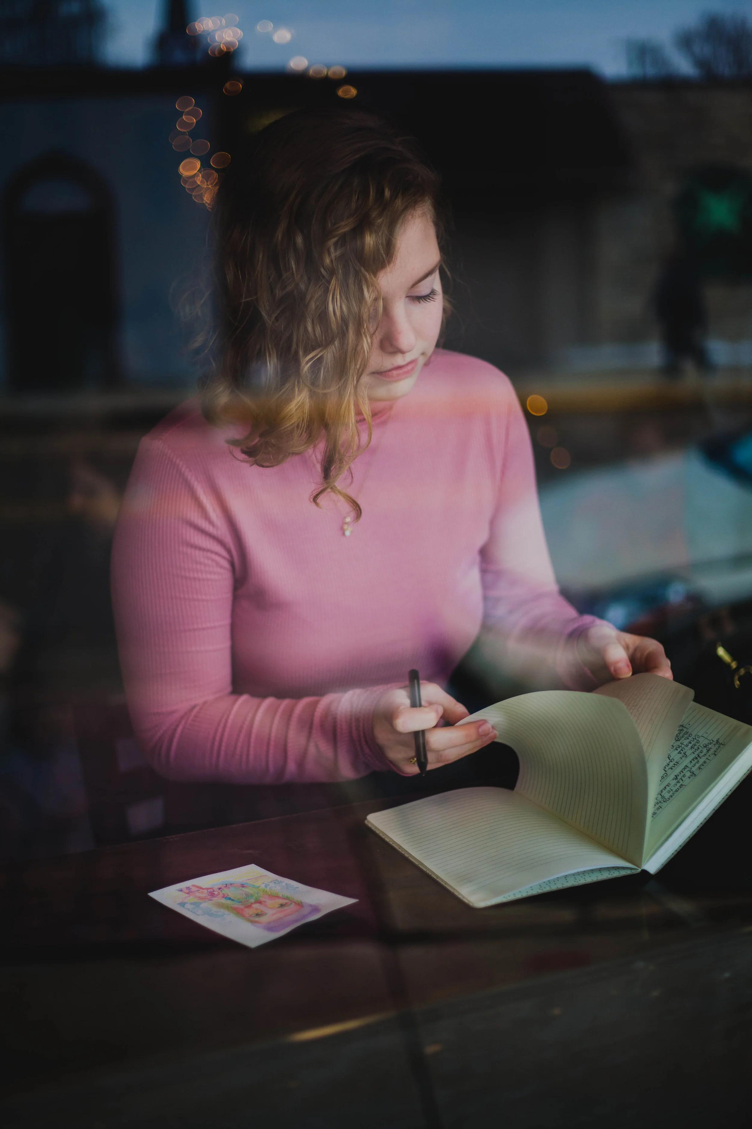 Woman writing in book.jpg