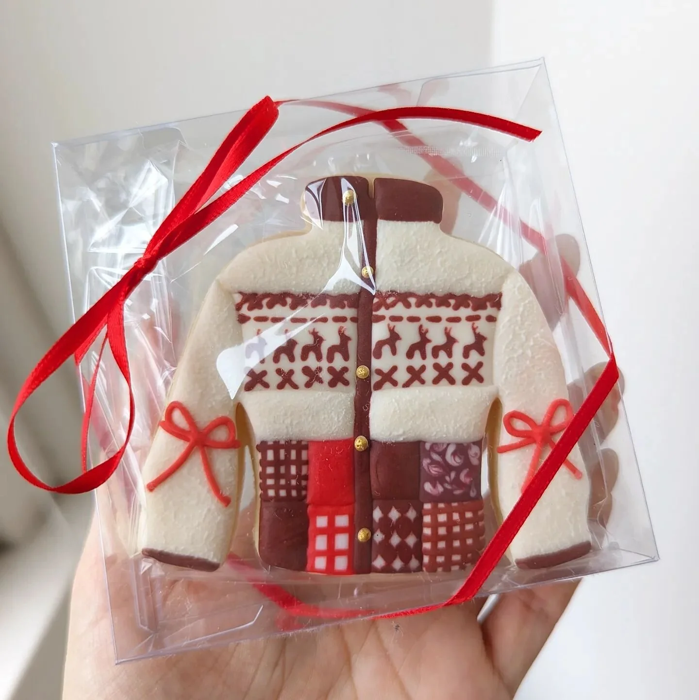 red block &amp; sherpa puffer cookies 🦌✨🥹