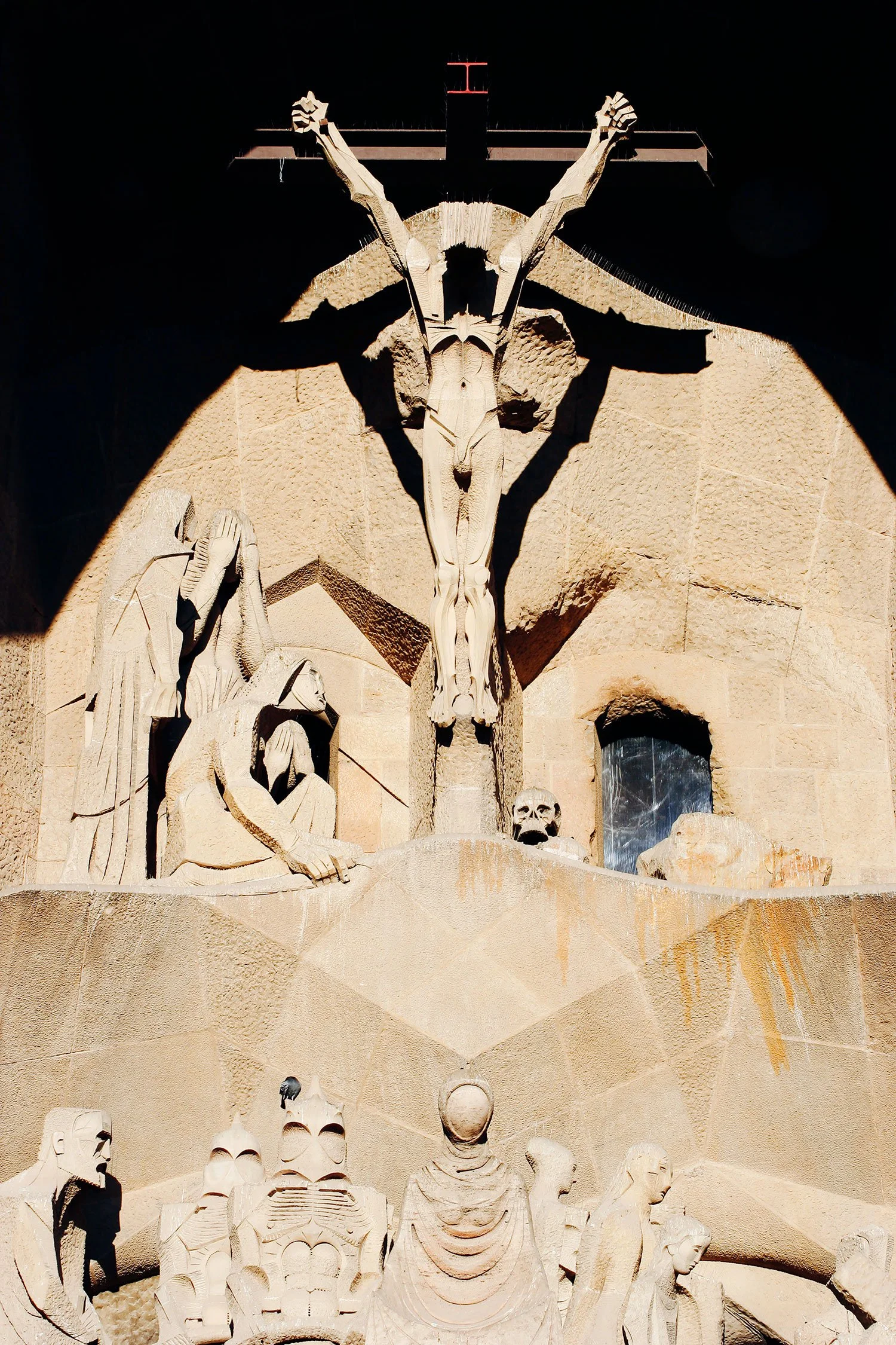  Sculpture from Passion Facade of the Sagrada Familia. Antoni Gaudi is seated in the lower left corner 