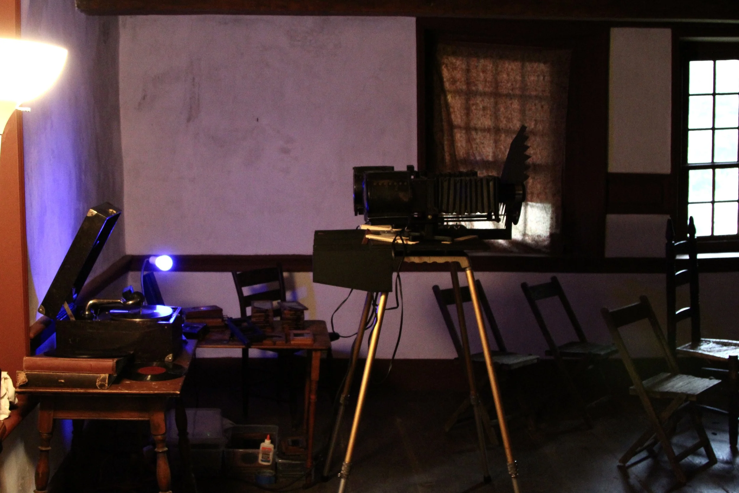 The spring-wound Victrola and Victorian projector worked together for the historical show