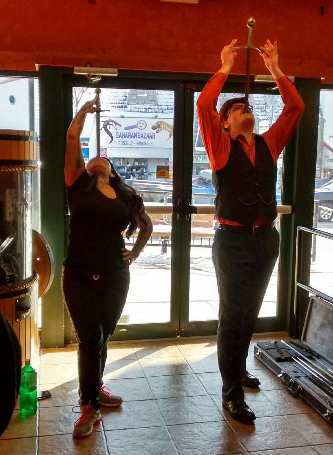  Kazimir (right) swallows a sword with Gigi DeLuxe, Femme Fatale of the Sideshow (left) at Ripley's Believe it or Not in Wisconsin Dells, WI as part of World Sword Swallower's Day 2017. 