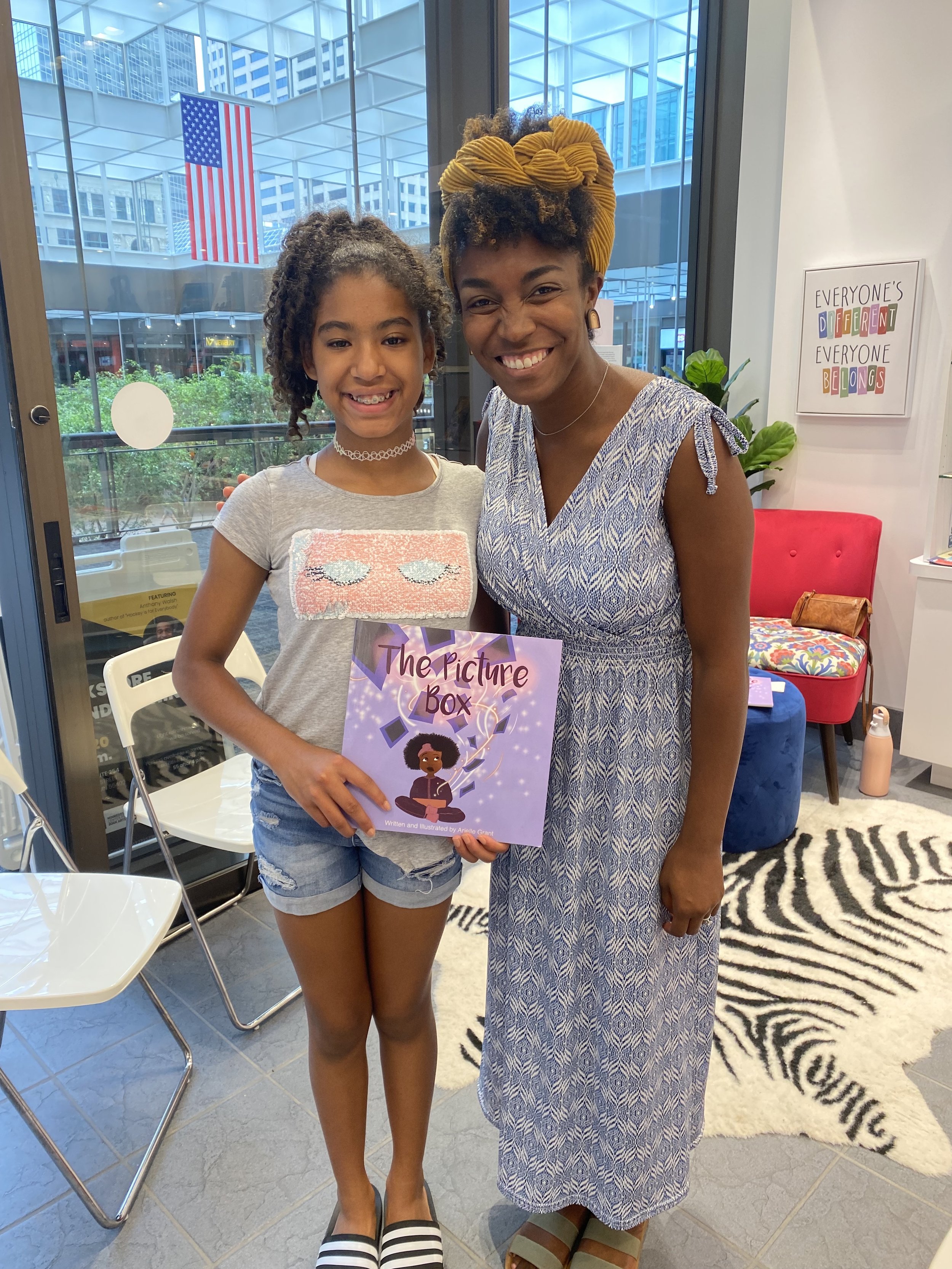 Arielle Grant with book talk attendee.jpg