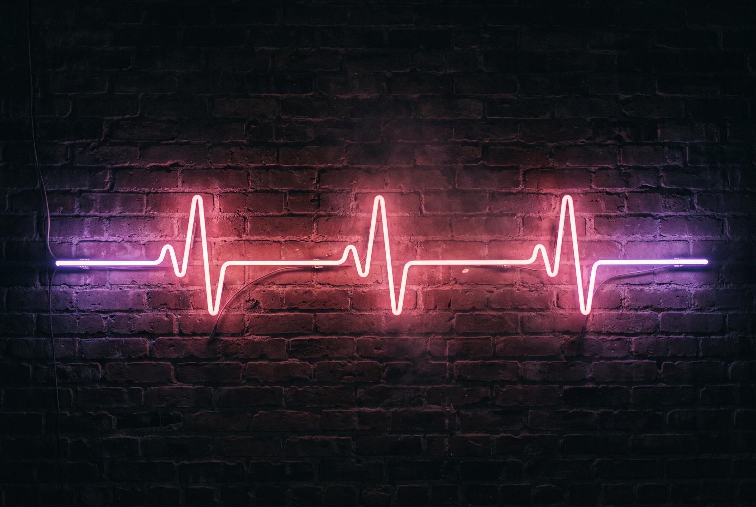 Neuronal Rhythmicity and Its Rate Variability