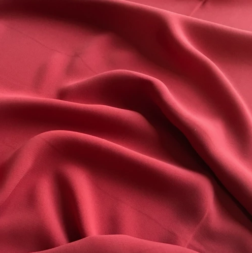 Crepe Plain Rust 150cm 100 polyester soft light weight drapey.png