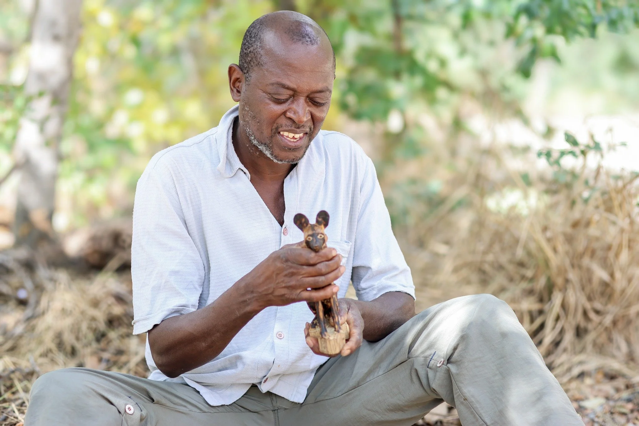 Lewis Mbewe from Mabale has been carving painted dog sculptures since 2001 &mdash; transforming creativity into livelihood, and conservation into community impact.

Through Painted Dog Conservation&rsquo;s Art &amp; Craft initiative, local artisans a