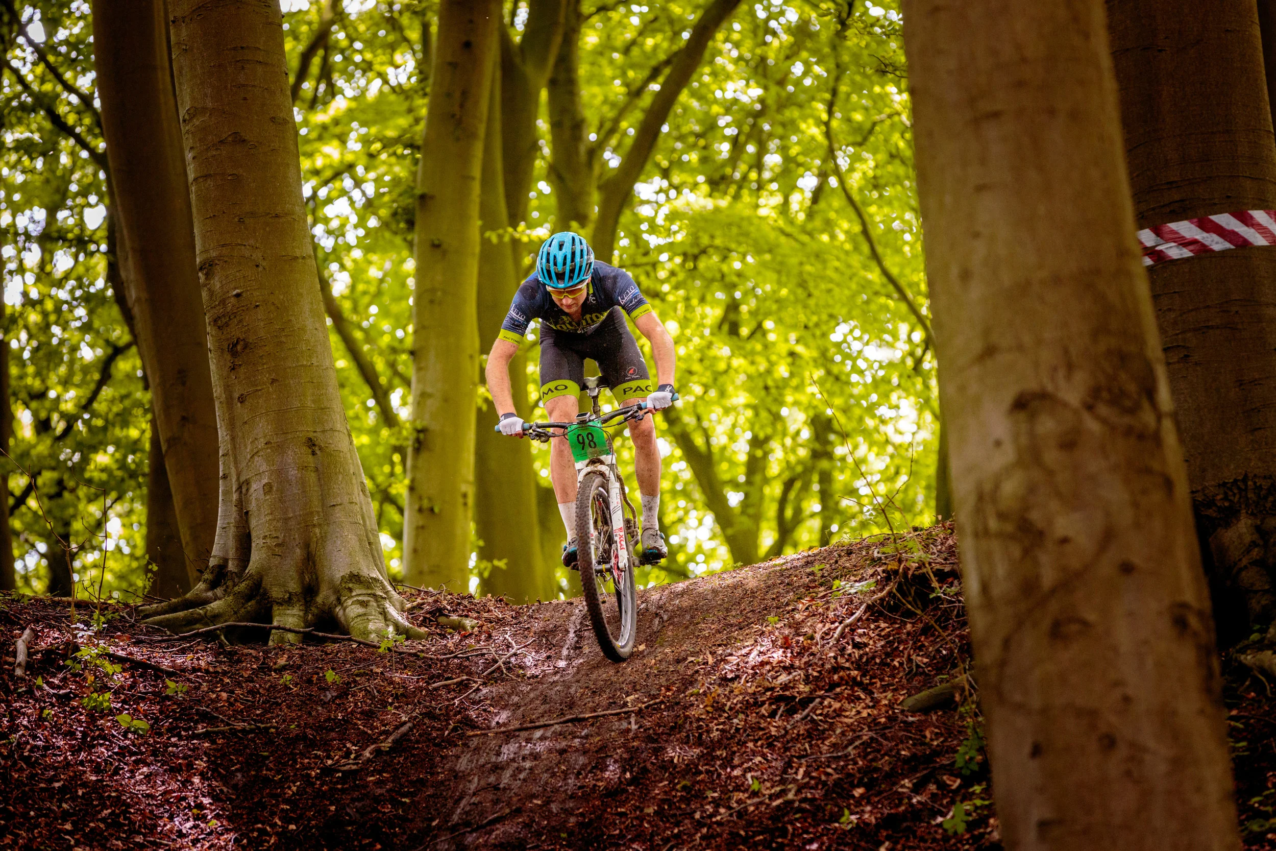 A mountain biker negotiating a steep decent