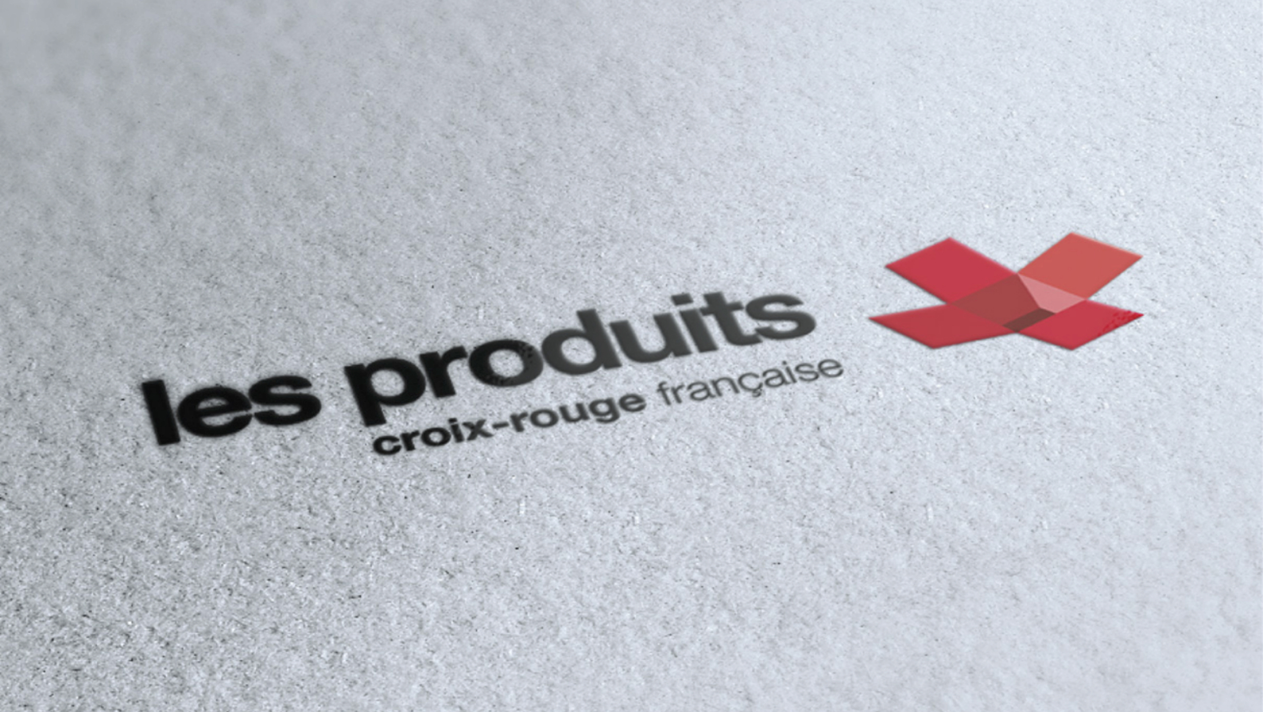 The logo itself represent the unfolded red box creating a strong visual connection with the Red Cross logo. It is accompanied with wordmark in bold sans serif typography.