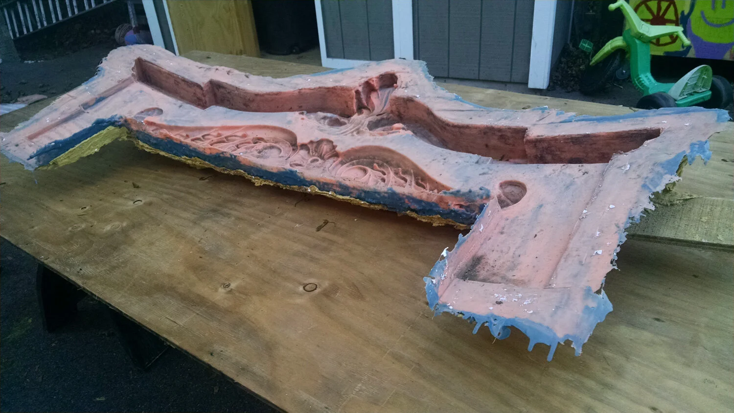 The finished curved mold ready for the hand layup cement casting.