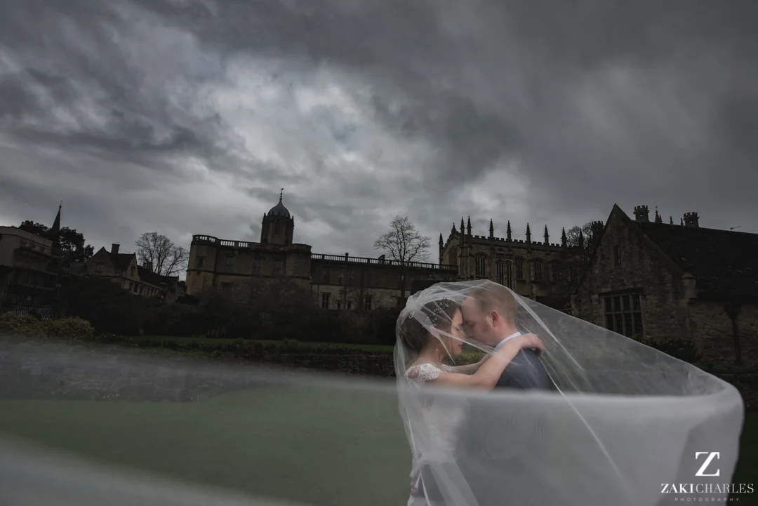 Bride and Groom portrait with veil flowing 