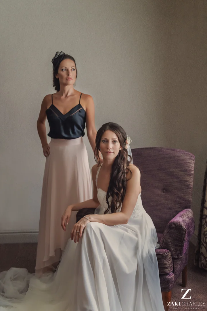 Bride sitting with her maid of honour