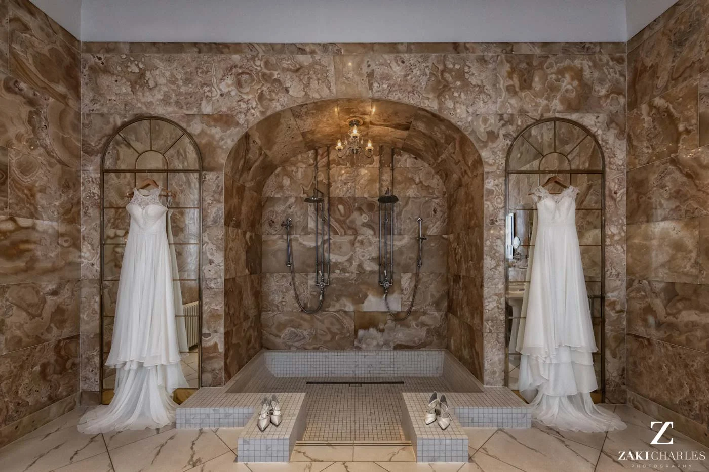 Wedding dresses hanging at Hedsor House bathroom photo