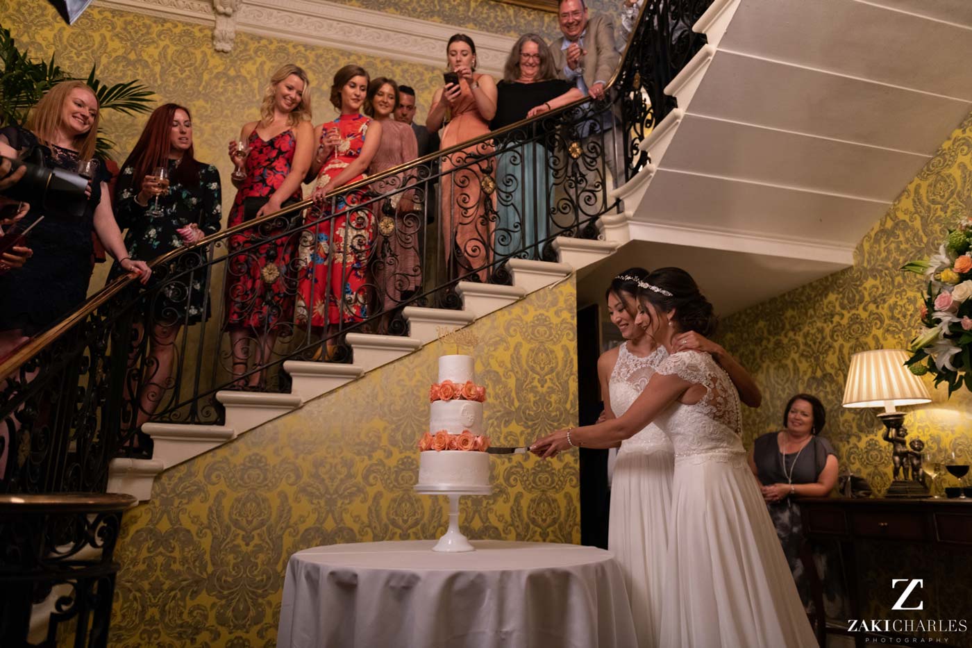 Cutting the wedding cake at Hedsor House