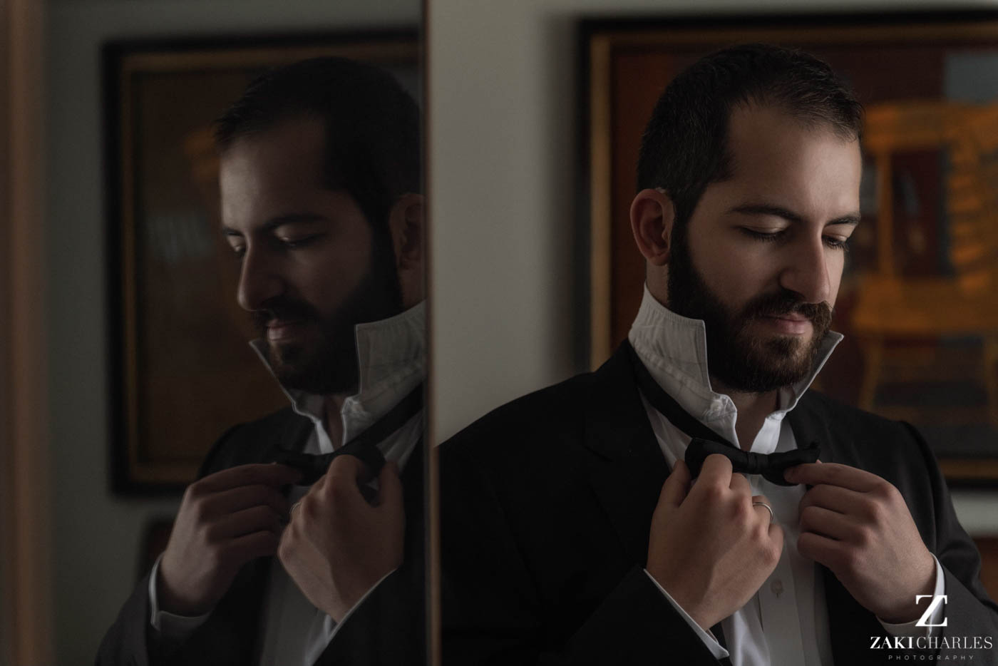 Natural light portrait of groom preperation at Marriott Hotel Regents Park 1