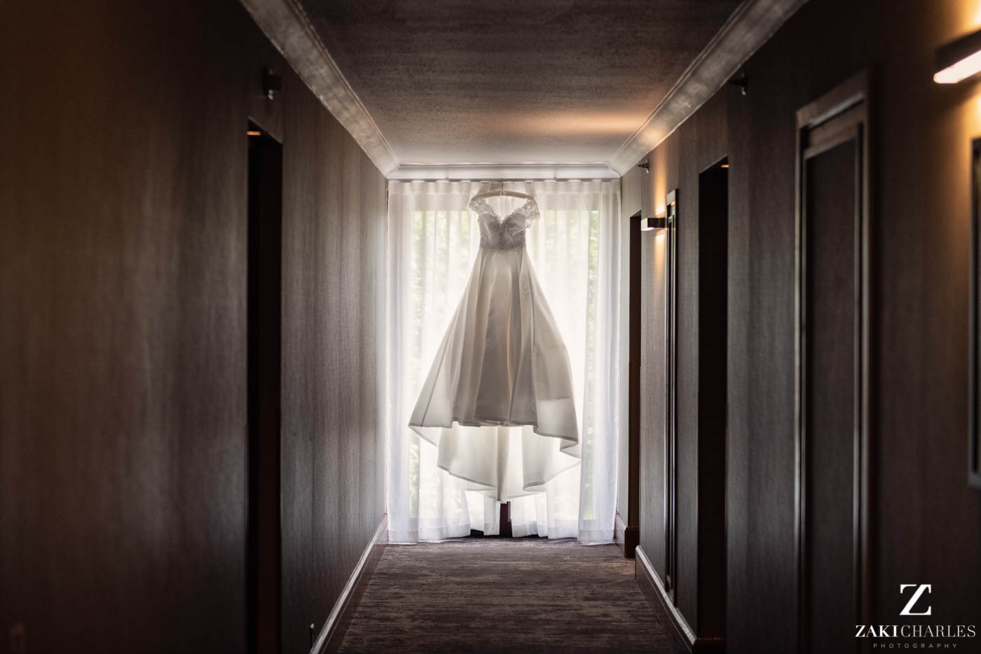 Dress of the bride hanging in Marriott Hotel Regents Park