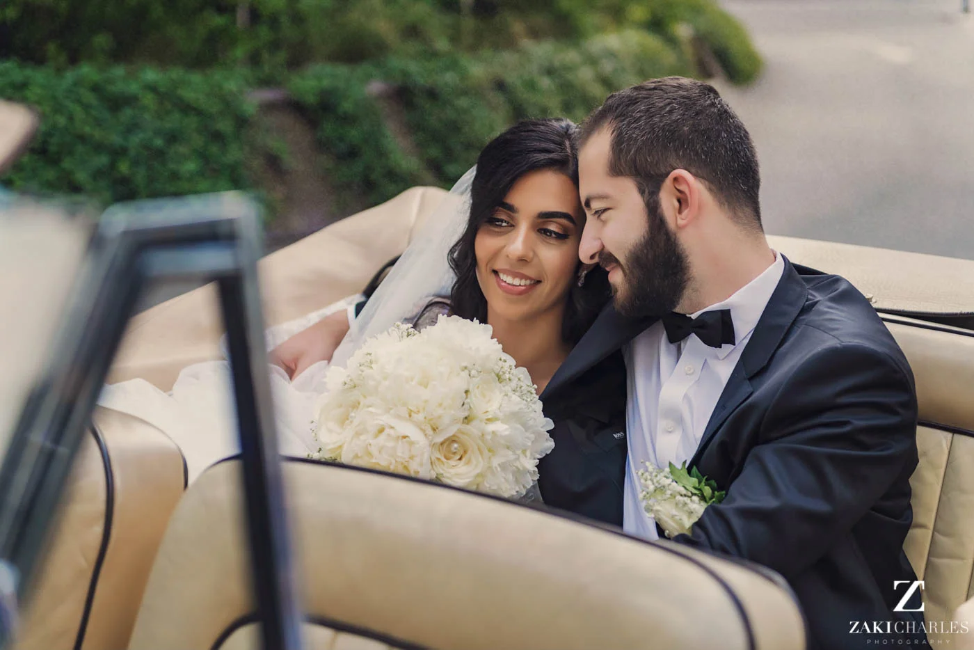 Bride and groom in the car 1