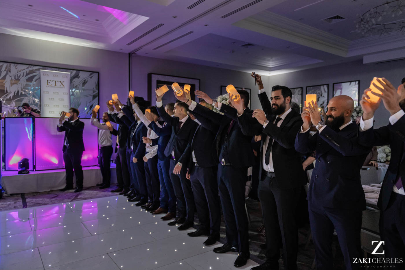 Guests waiting for the bride and groom to enter for their first dance 2
