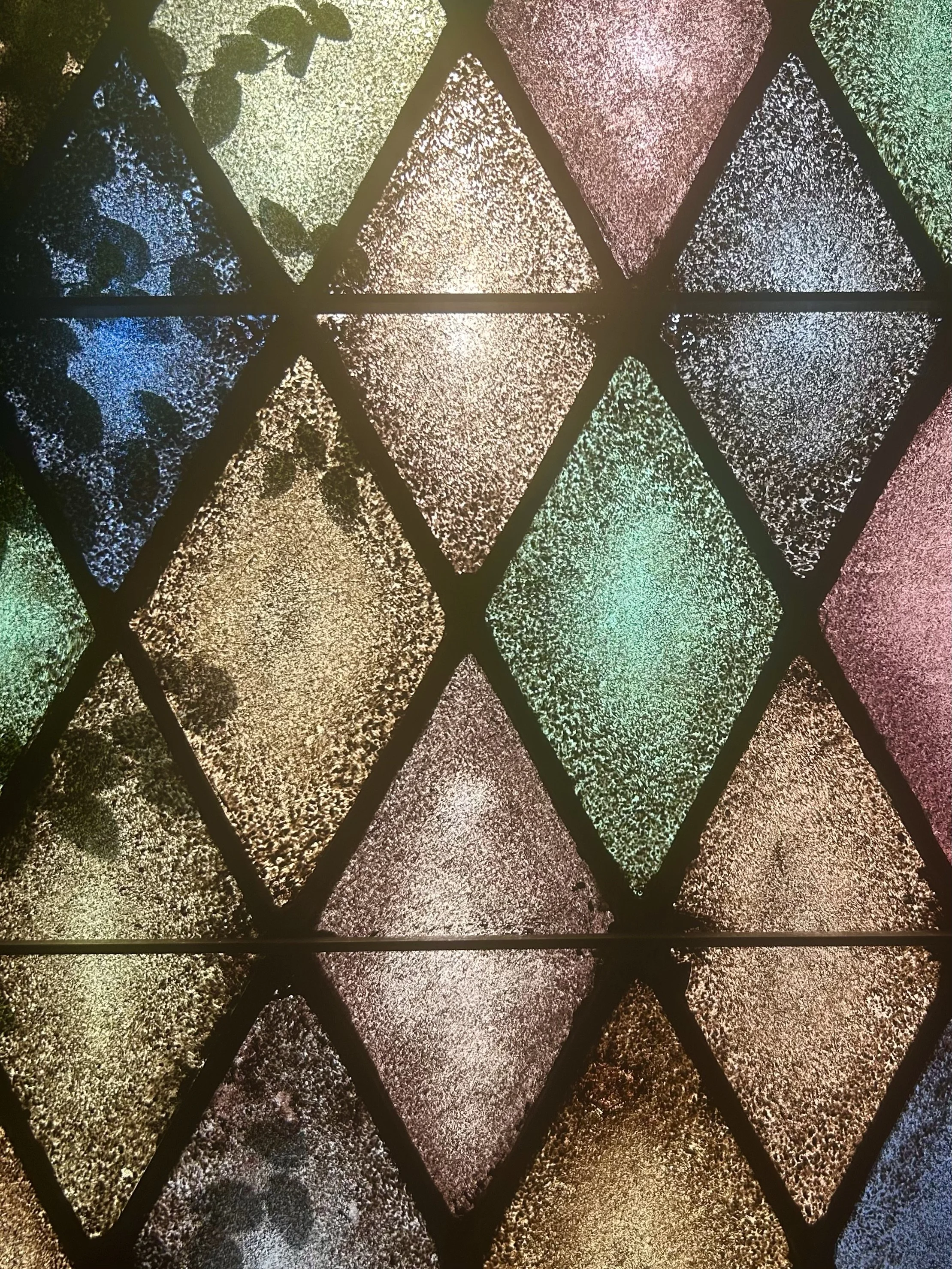 Stained glass inside Fondren Presbyterian Church's sanctuary