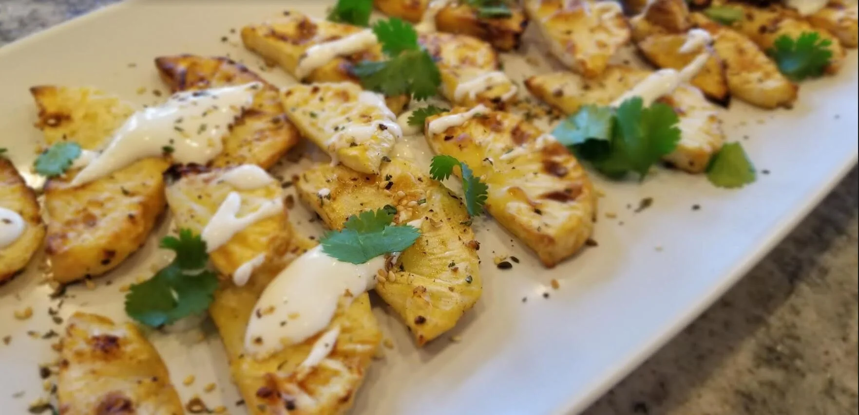 Roasted Celery Root with Yogurt and Sesame Seeds
