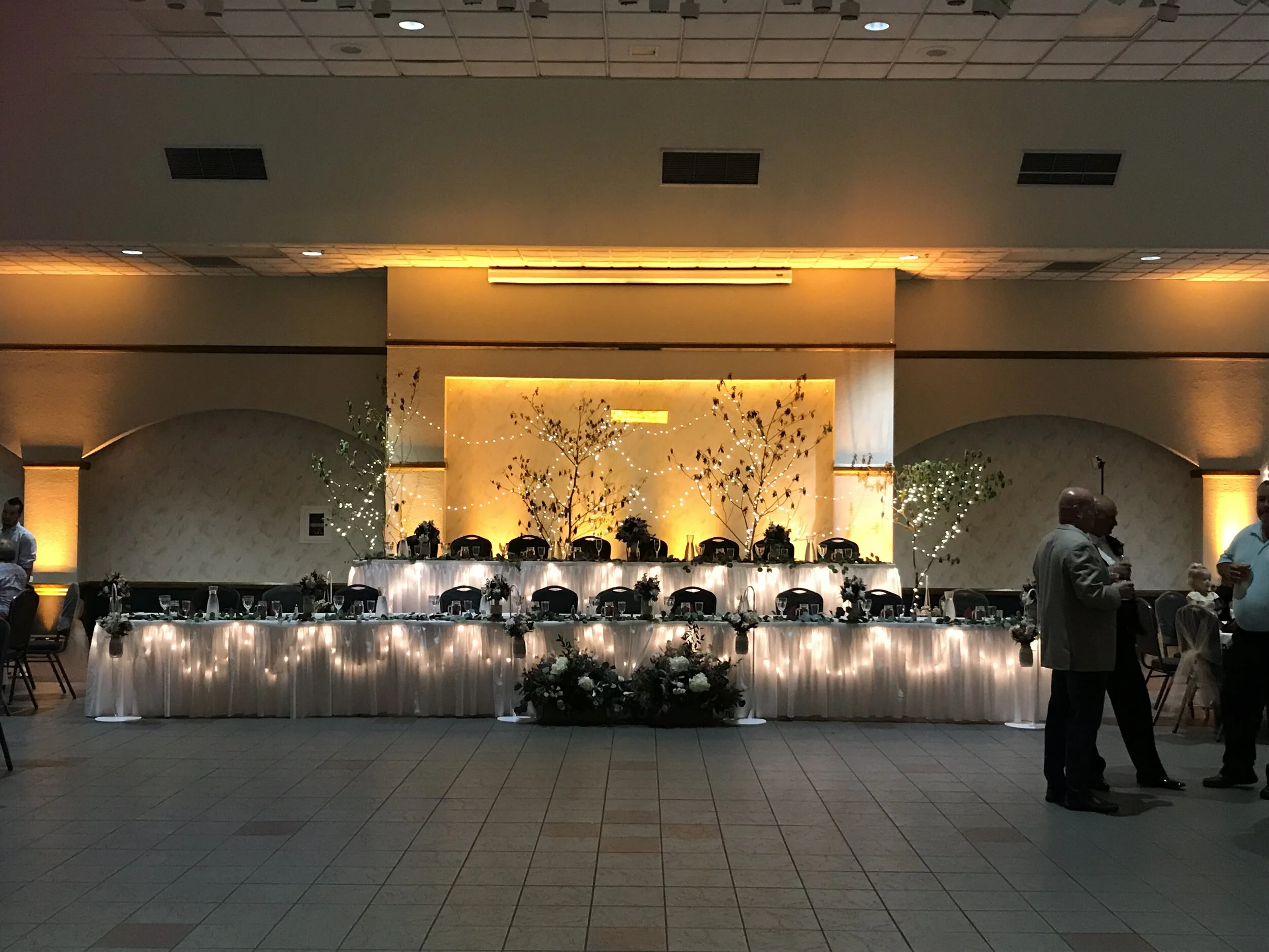 Head table with yellow uplights in Angola IN