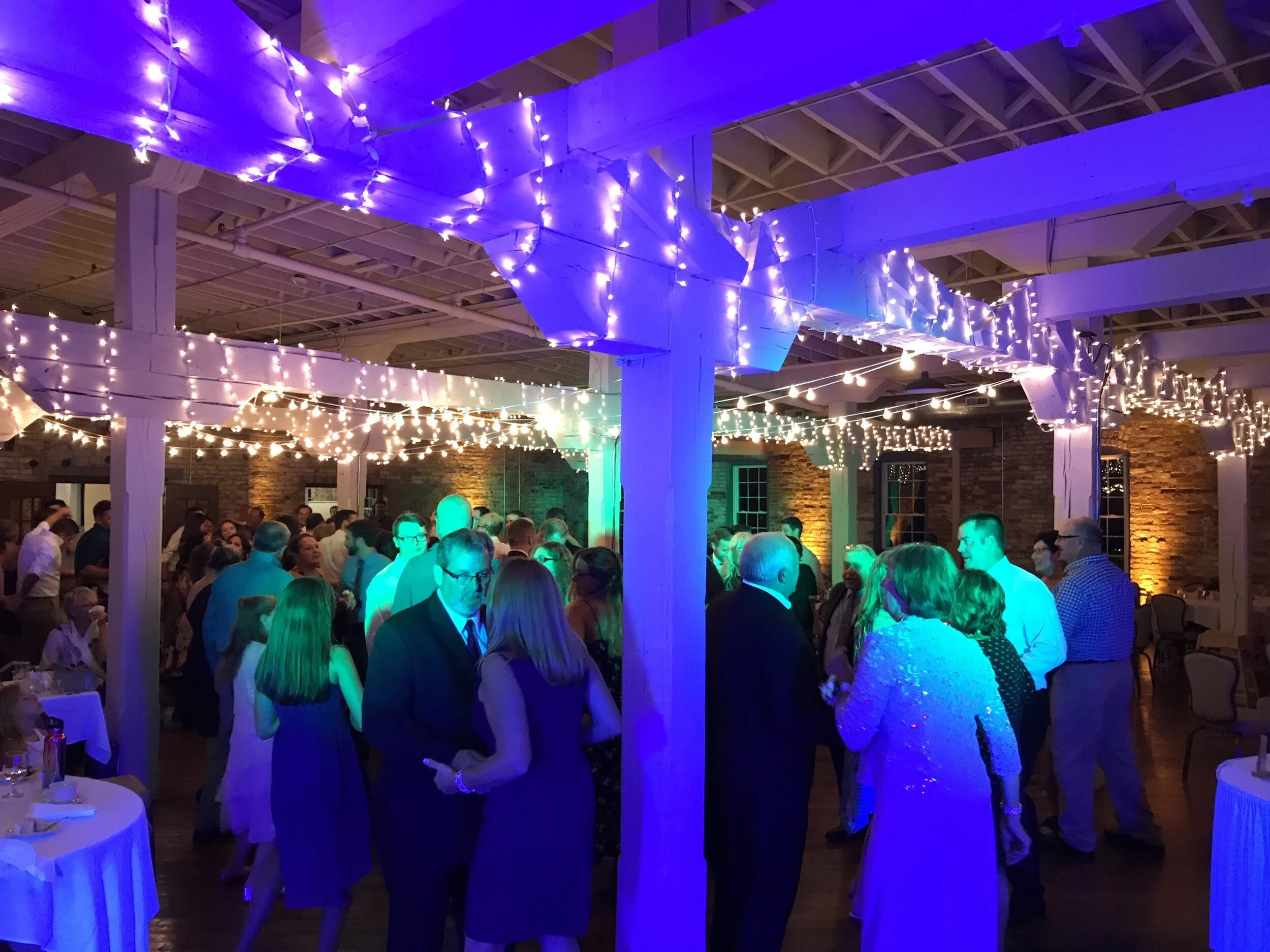 wedding reception with uplights and string lights in Goshen, IN