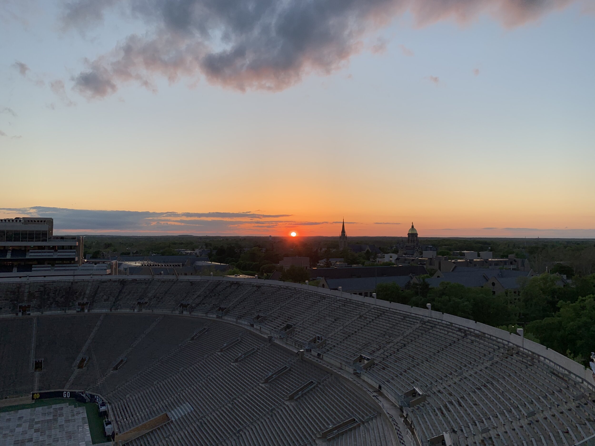 Sunset over Notre Dame Stadium with Golden Dome