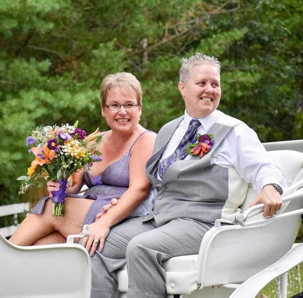 Same-Sex wedding carriage ride in Niles