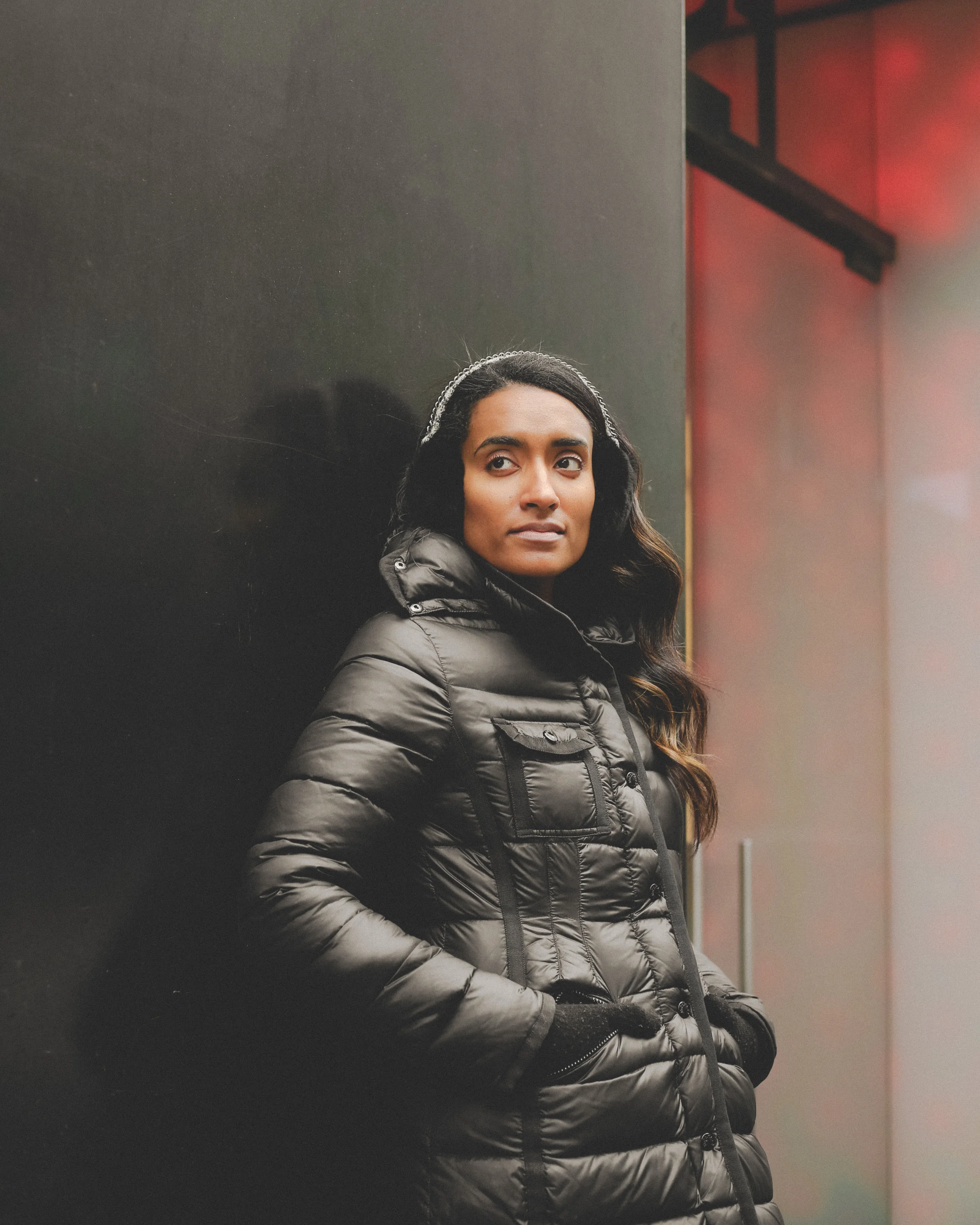 Krys wearing stylish earmuffs and puffy jacket.