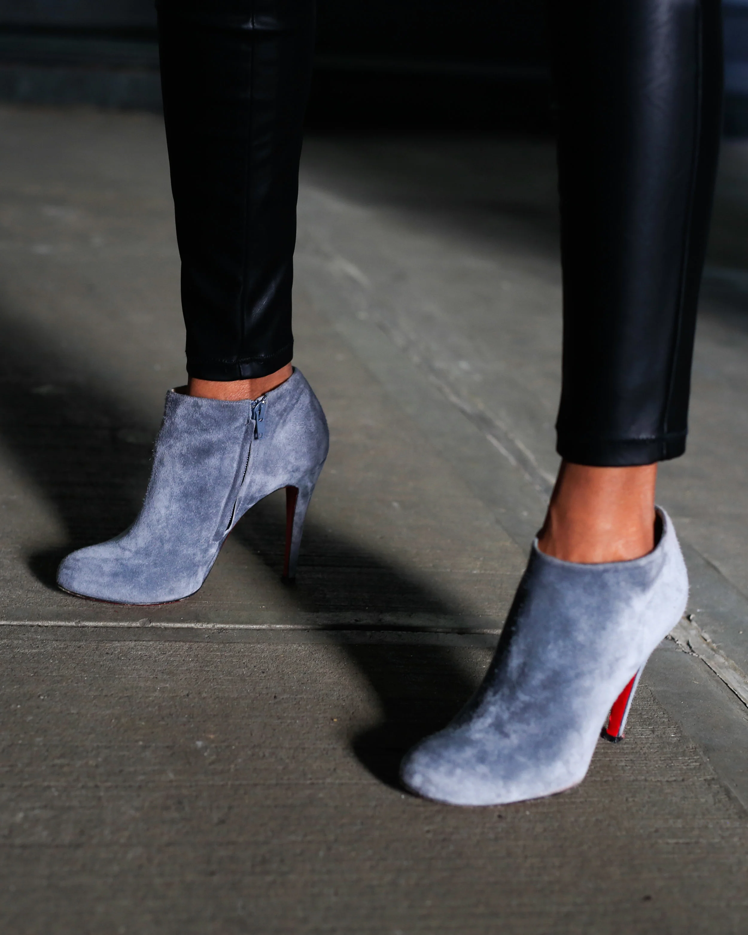 Close up shot of Kry’s Christian Louboutin booties.