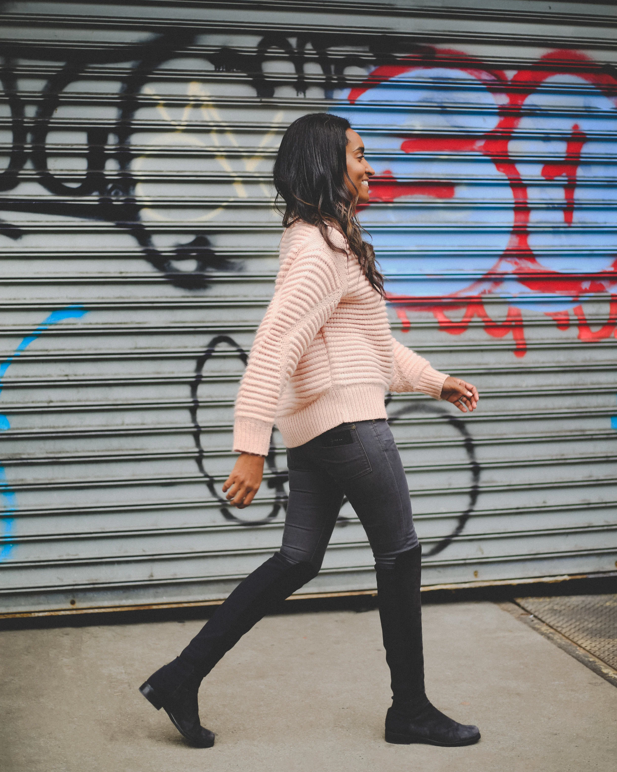 Krys showing off her fall attire while strutting down the street.