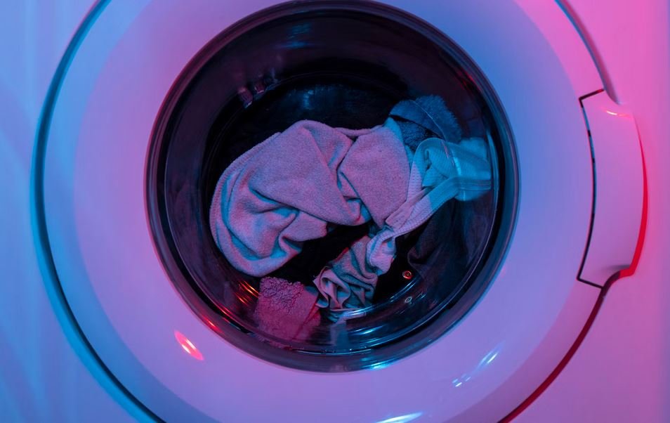 Washer Stuck On Spin? (Here's Why And How To Fix It)