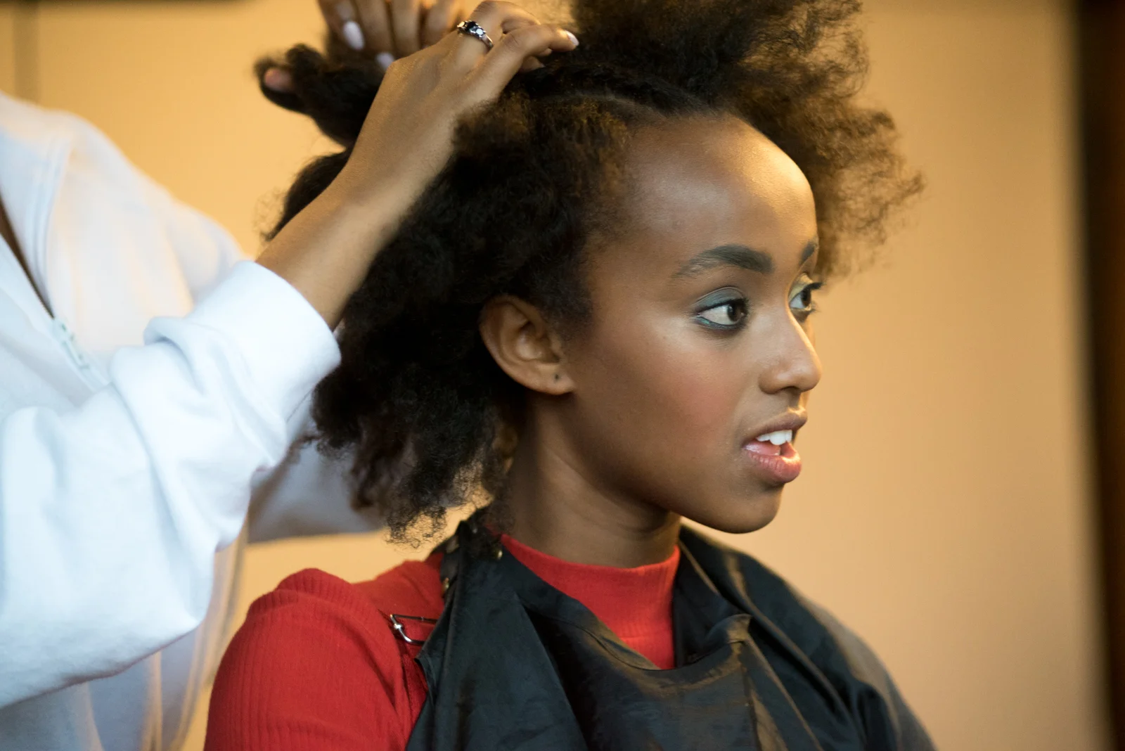 Behind the scenes with Miron Girmay and sister Saba. Photo credit: Sonia Sly