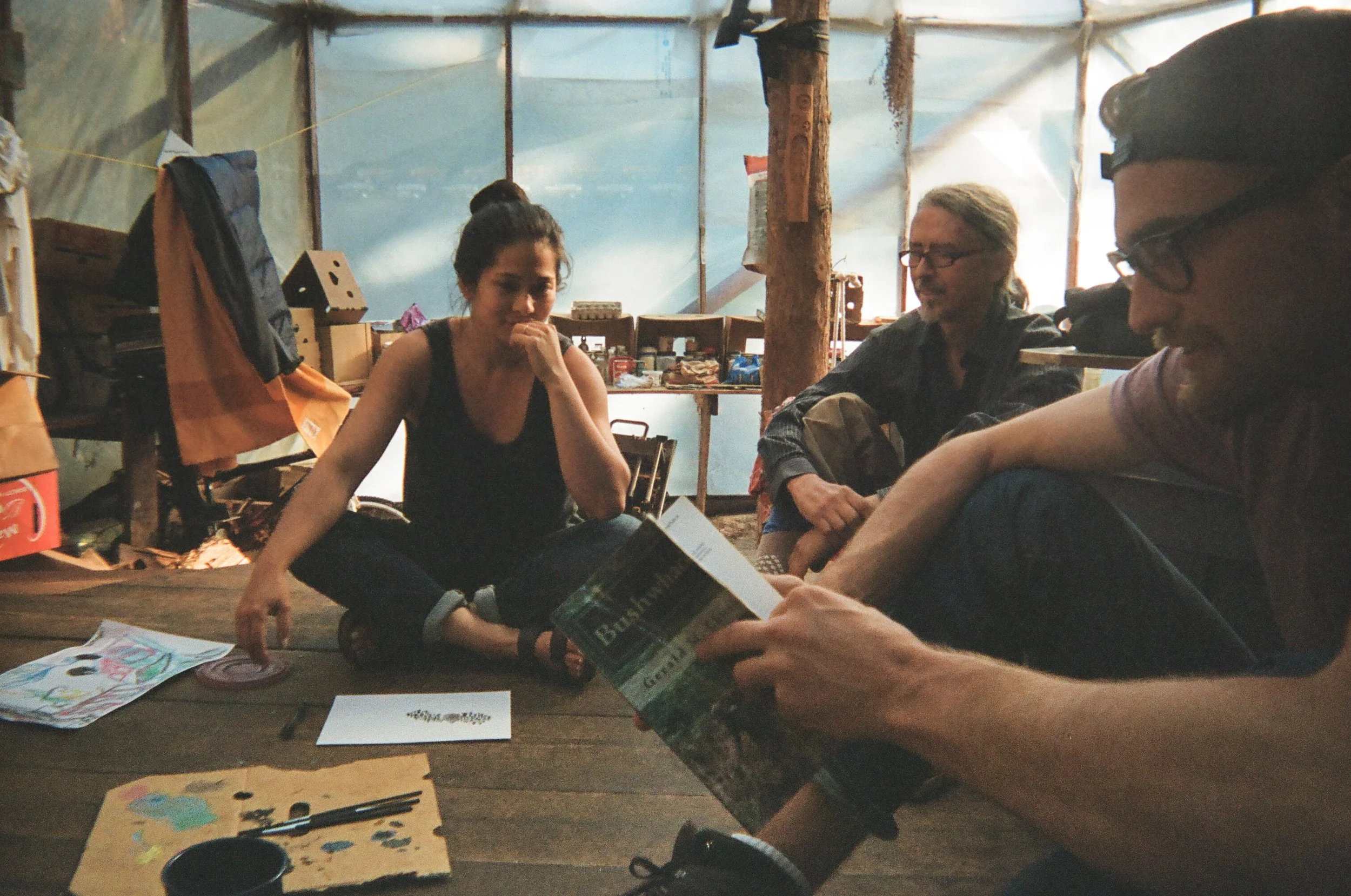 Painting and reading in the yurt on our last afternoon.