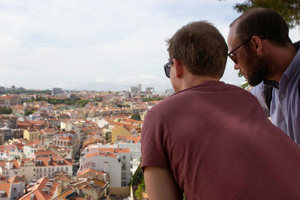 Gavin (far right) looking out over Lisbon.