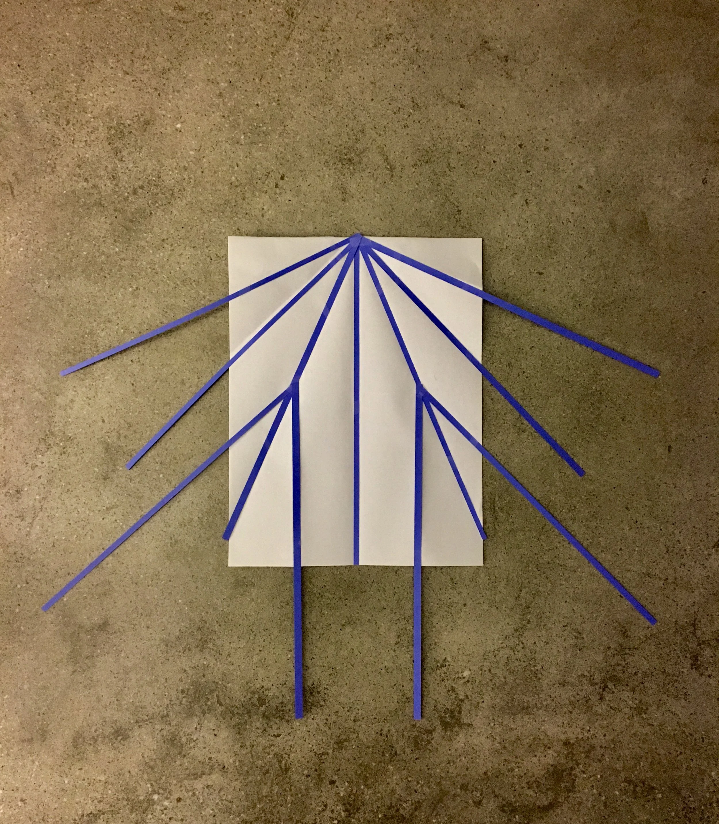 Air Air // logo development with cut paper and an unfolded paper airplane, in progress