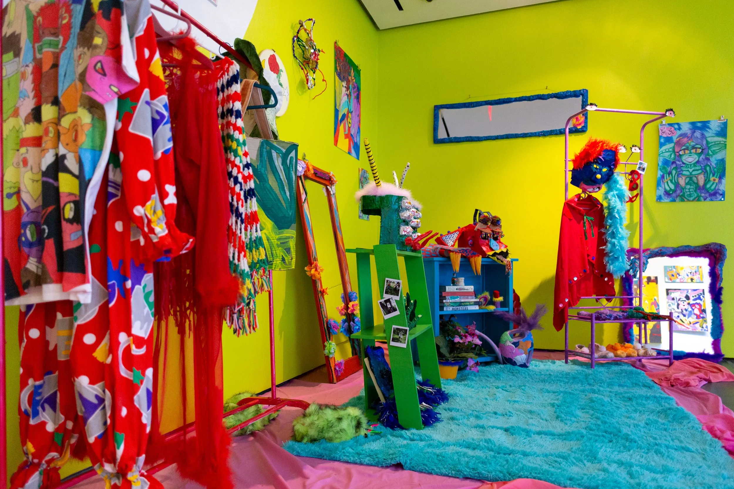  The collaborative installation featured masks, props and costumes from the portraits, alongside illustrations, wall-pieces and custom-modified furniture pieces.  