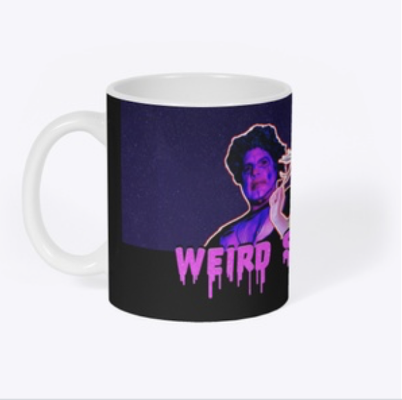 A white coffee mug with a purple and black graphic of a woman smoking, with the word "WEIRD" in pink dripping letters.