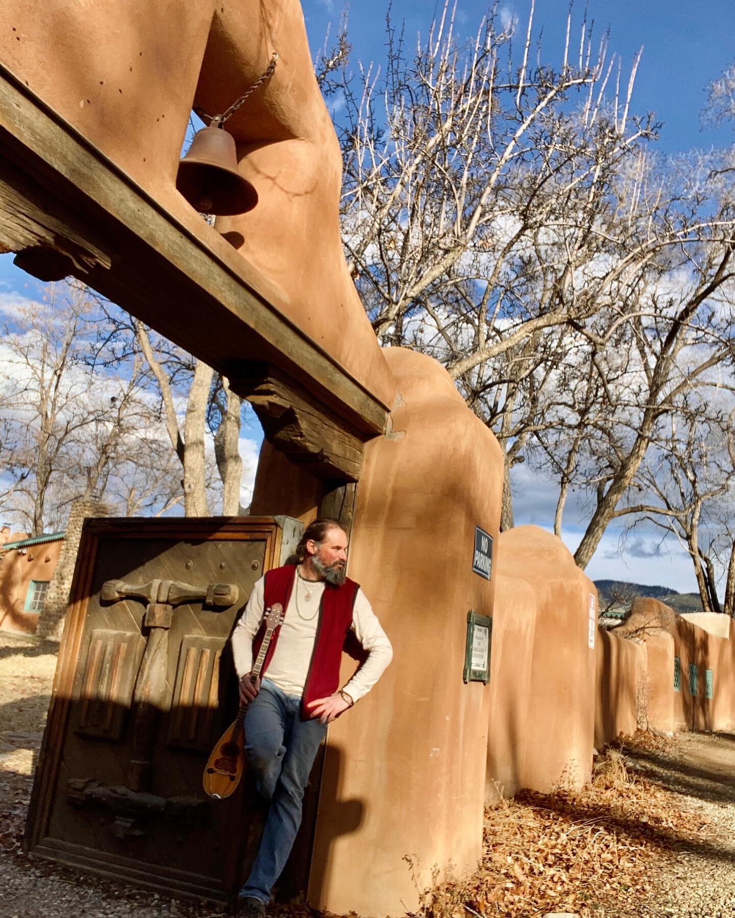 🤍 Exploring my town&rsquo;s unique charm with my musical sidekick on my trusted silver stallion 🚴🏼. The diversity of the land here always amazes. 
✨🤍Home base🤍✨
#taos #newmexico #musicianslife #southweststyle #nativeculture #spiritualcommunity