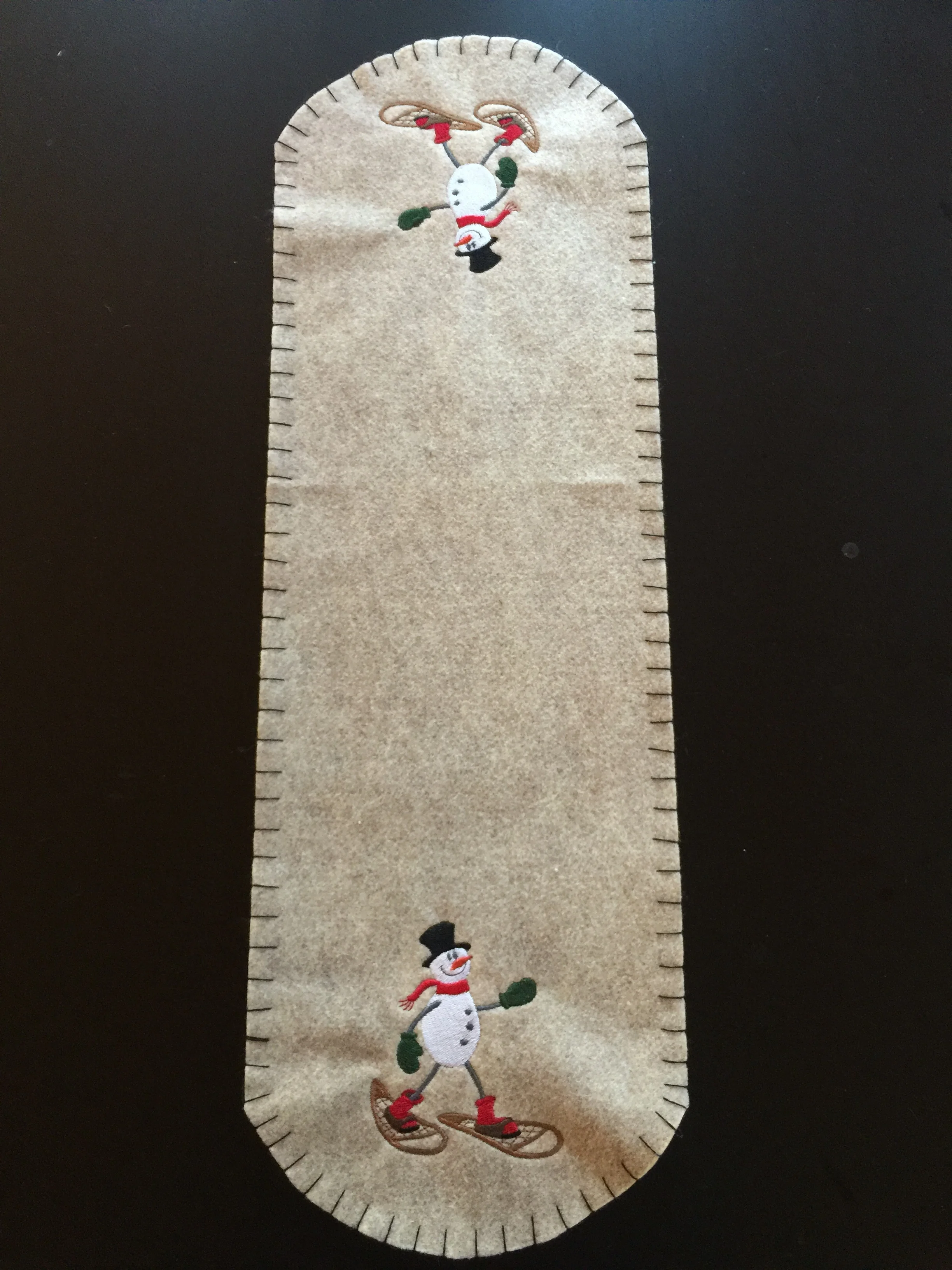 Snowman snow shoeing