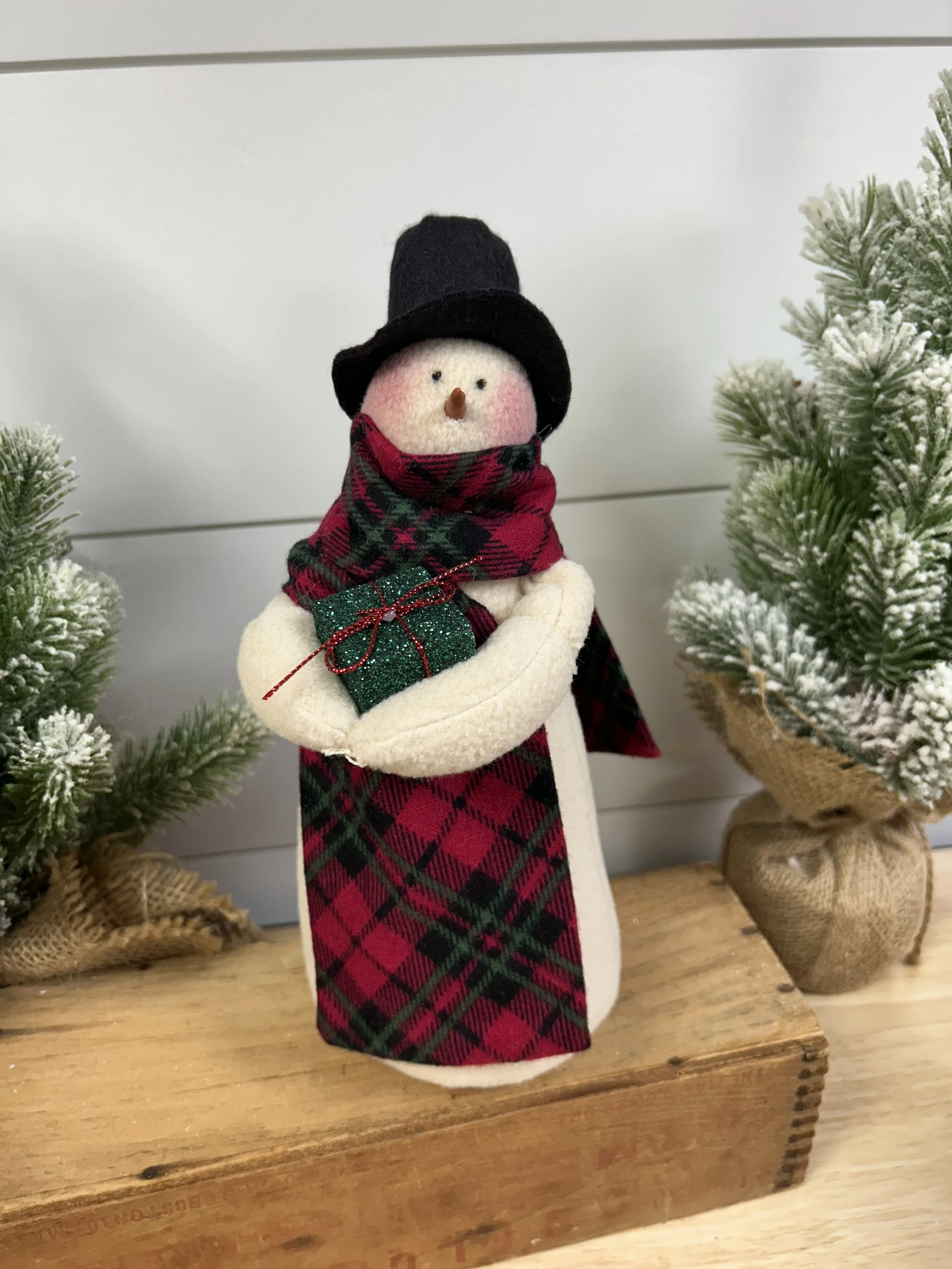 Snowman with present